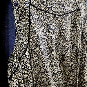 Blue and creme floral jumpsuit with pockets